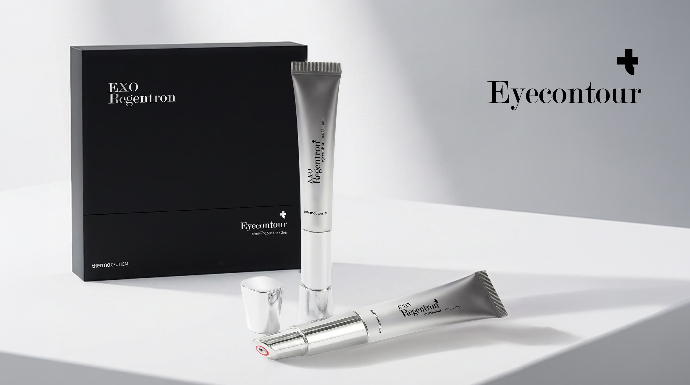EXO Regentron Eyecontour mit Packaging und integrierter Anwendungseinheit auf heller Premium-Bühne